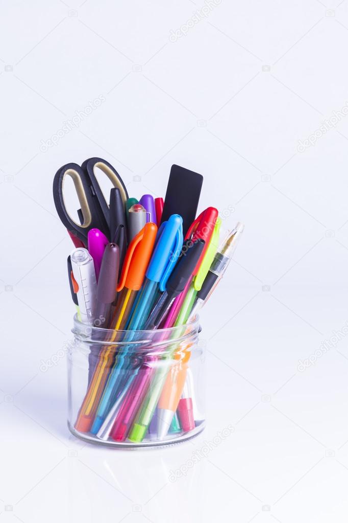 Colorful pens in glass jar Stock Photo by ©jenbray 80139368